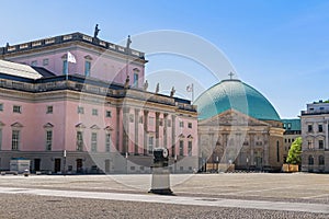 Bebelplatz with the State Opera building and St. Hedwig`s Cathedral in Berlin, Germany