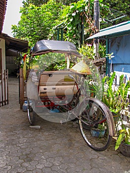 Becak bike taxi, popular in Asia photo