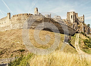 Beckov castle ruins, dried grass in the meadow, Slovakia