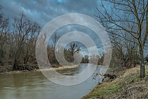 Becva river near Prerov town in cloudy cold winter morning