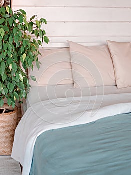 Bed in country house, closeup photo