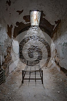 Bed frame in a prison cell