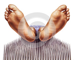 Bed of nails with fakir viewed from feet.