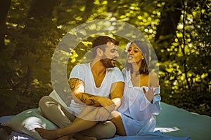 Bed in nature. Couple spending time together.