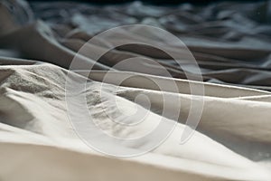 Bed after sleeping in the morning in the sun, white bed with mattress using for background