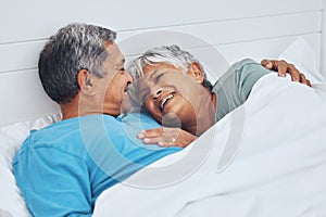 Bed, smile and senior couple with love, relax and marriage with retirement, relationship and conversation. Morning