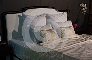 Bed with white pillows