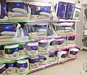 Bedding, duvets and pillows in a store.