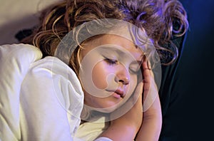 Bedding kid. Child sleeping in bed. Cute kid sleeping under blanket. Kid lying on pillow. Child rest asleep, enjoy photo