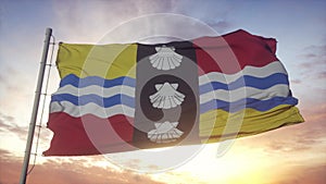 Bedfordshire flag, England, waving in the wind, sky and sun background