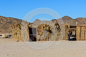 Bedouin building of palm twigs in a desert not far from Hurghada city, Egypt