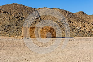 Bedouin building of palm twigs in a desert not far from Hurghada city, Egypt