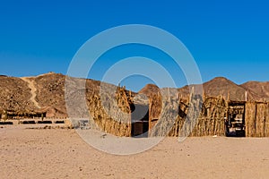 Bedouin building of palm twigs in a desert not far from Hurghada city, Egypt