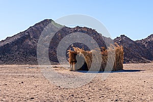 Bedouin building of palm twigs in a desert not far from Hurghada city, Egypt