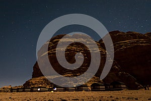 Bedouin tent camp under the stars of Wadi Rum, Jordan, at night