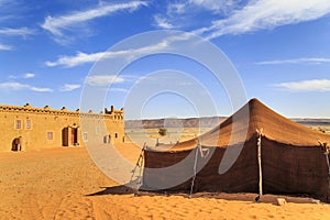 Bedouin tent with clear blue sky above it