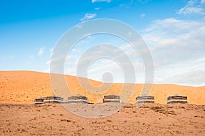 Bedouin tents in desert on sun rise, wahiba sand,oman