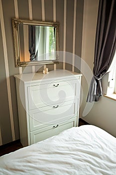 Bedroom cabinet with drawers and mirror