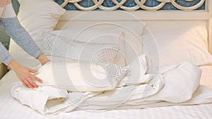 Bedroom comfort bedding sheets woman making bed photo