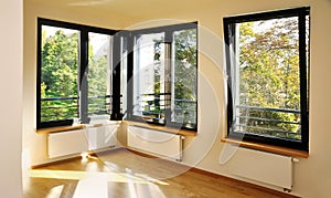 Bedroom with corner windows photo