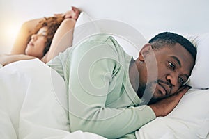 Bedroom, couple conflict and sad black man in morning after fighting, argument and relationship problem. Depression