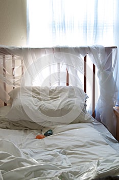 Bedroom detail simple with sunlight and healing stones