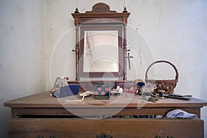 bedroom dresser with mirror in abandoned house