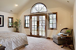 Bedroom with French Door Balcony photo