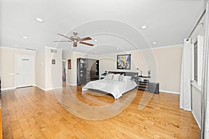 Bedroom interior with a bed, TV, and cabinet in Encino, CA