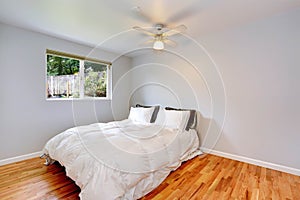 Bedroom interior with comfortable white bed