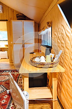 Bedroom interior in glamping. A cozy tent house.