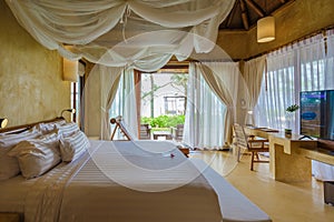 bedroom Interior of modern house with a swimming pool, modern pool villa at the beach, luxury villa