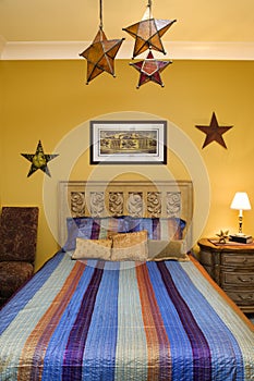 Bedroom Interior With Striped Bedspread and Decora