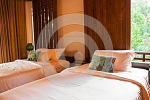 Bedroom interior with wooden window