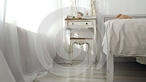 Bedroom of my dream. Tracking shot of elegant bedroom in a stylish, classically designed home with a contemporary feel