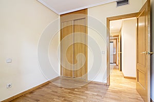 Bedroom in room with air conditioning through ducts and French oak flooring and entrance door of the same material and long