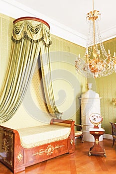 Bedroom with royal canopy bed photo