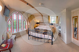 Bedroom with stained-glass window (The Belfry) photo