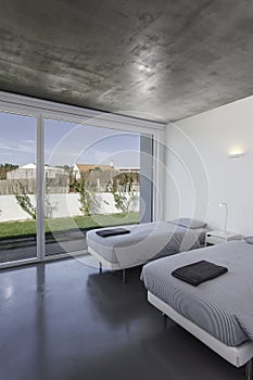 Bedroom with two bed in modern vacation house