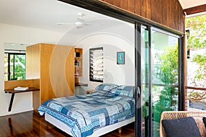 Bedroom with a view, open on a deck with sliding doors