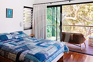 Bedroom with a view, open on a deck with sliding doors