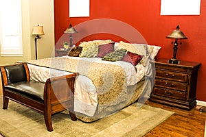 Bedroom With Wooden Furniture And Settee
