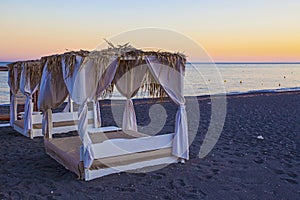 Beds in cafe on the Aegean sea cost on Santorini