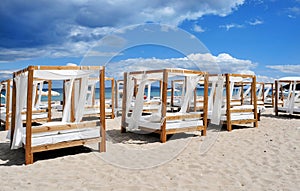 Beds and sunloungers in a beach club in Ibiza, Spain