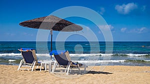 Beds and umbrella on the beach