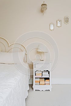 Bedside table with books