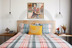 a bedspread with a seersucker texture on a poster bed