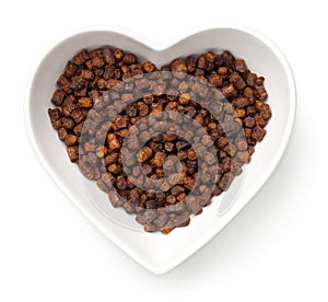 Bee Pollen Propolis In Heart Bowl Isolated