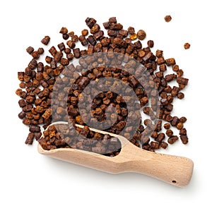 Bee Pollen Propolis In Wooden Scoop Isolated