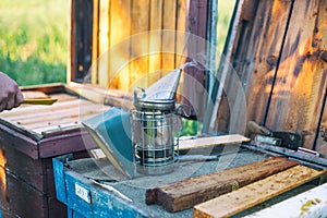 Bee smoker with smoke copy space beekeeping apiarists professional equipment technology tool concept